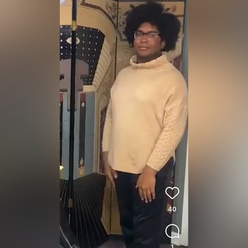 Cream sweater with wide neck